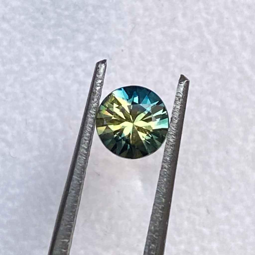 0.68ct round Australian parti sapphire - Lizunova Fine Jewels
