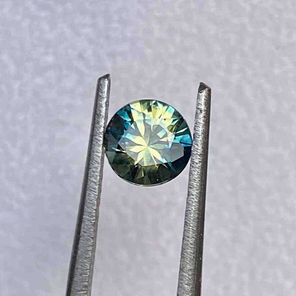 0.68ct round Australian parti sapphire - Lizunova Fine Jewels