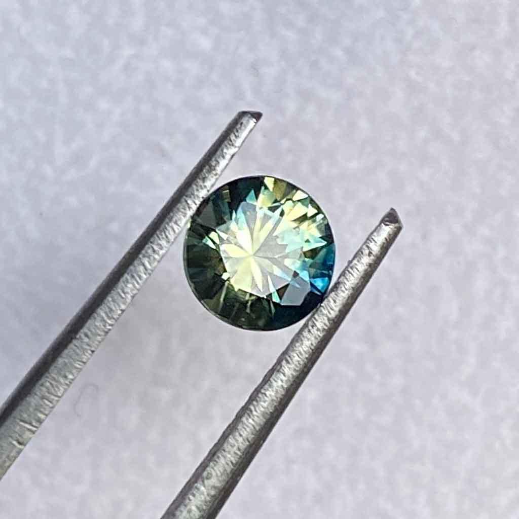 0.68ct round Australian parti sapphire - Lizunova Fine Jewels