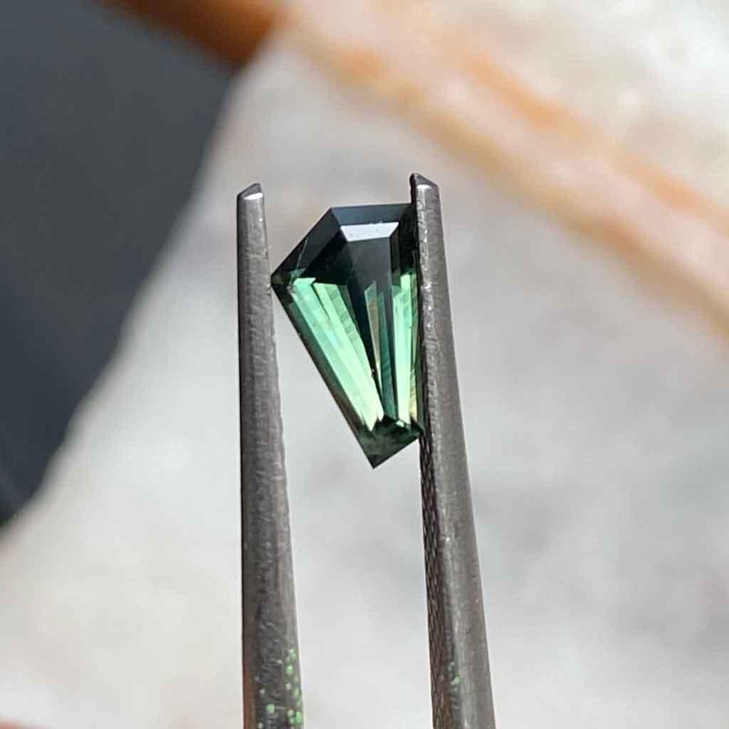 0.73ct freeform Australian teal sapphire - Lizunova Fine Jewels