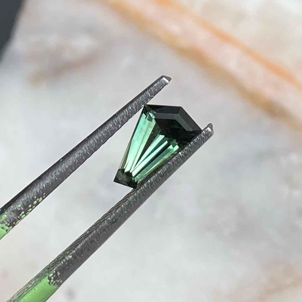 0.73ct freeform Australian teal sapphire - Lizunova Fine Jewels