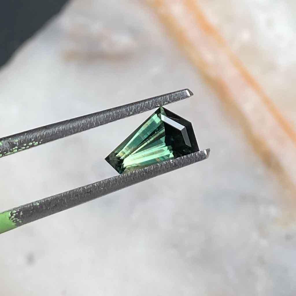 0.73ct freeform Australian teal sapphire - Lizunova Fine Jewels