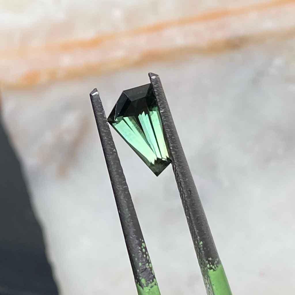 0.73ct freeform Australian teal sapphire - Lizunova Fine Jewels