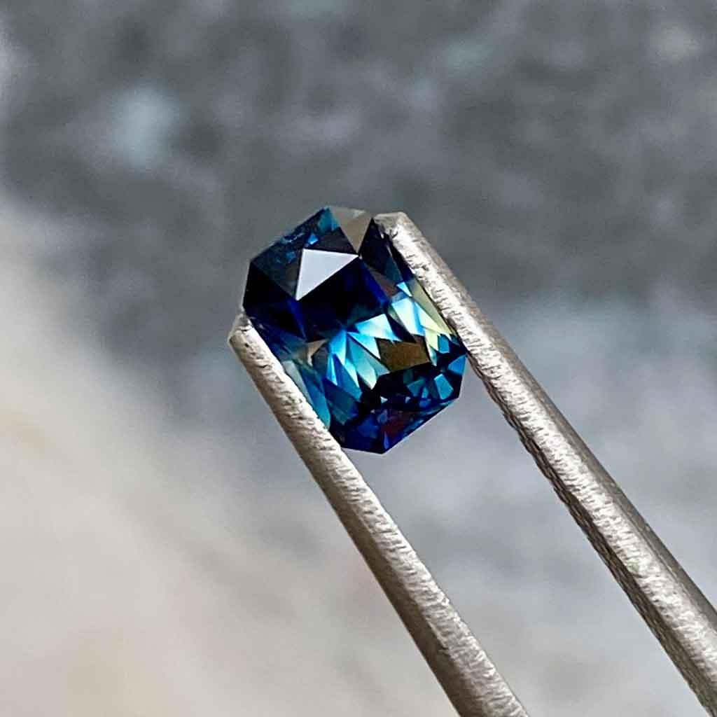 0.93ct emerald radiant cut Australian parti sapphire - Lizunova Fine Jewels