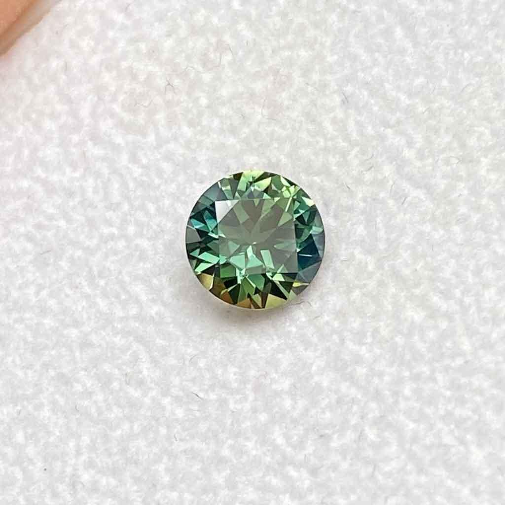 0.96ct round Australian light green sapphire - Lizunova Fine Jewels