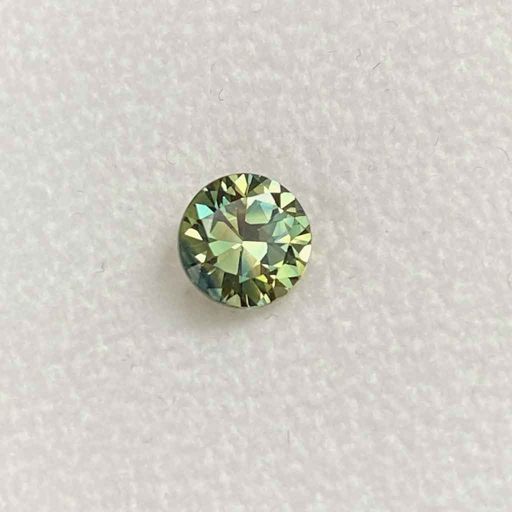Australian-parti-teal-sapphire-bespoke-engagement-ring-Sydney-jeweller-Lizunova-Fine-Jewels jeweller Lizunova Fine Jewels
