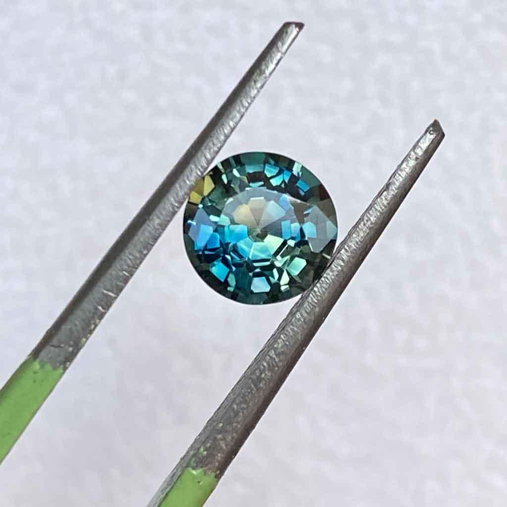 1.22ct round Australian teal parti sapphire - Lizunova Fine Jewels