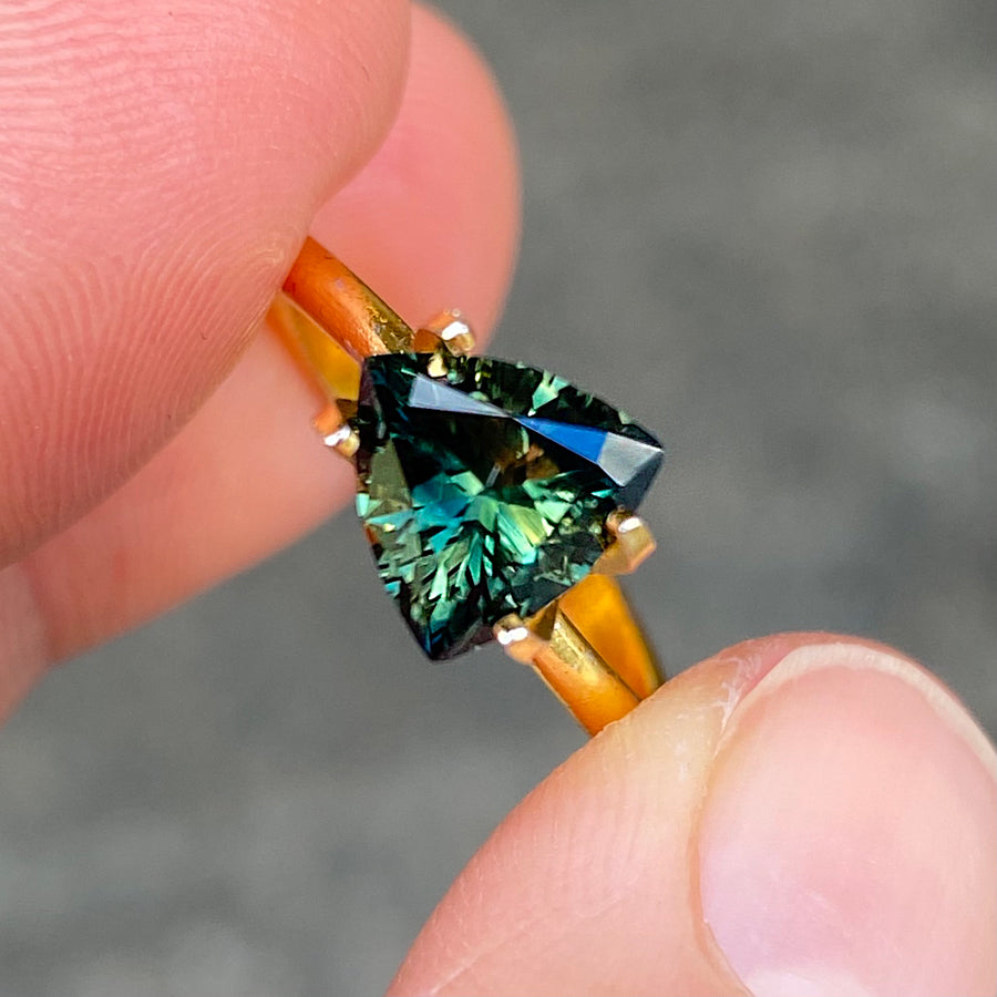 Australian-trilliant-parti-teal-sapphire-bespoke-engagement-ring-Sydney-jeweller-Lizunova-Fine-Jewels