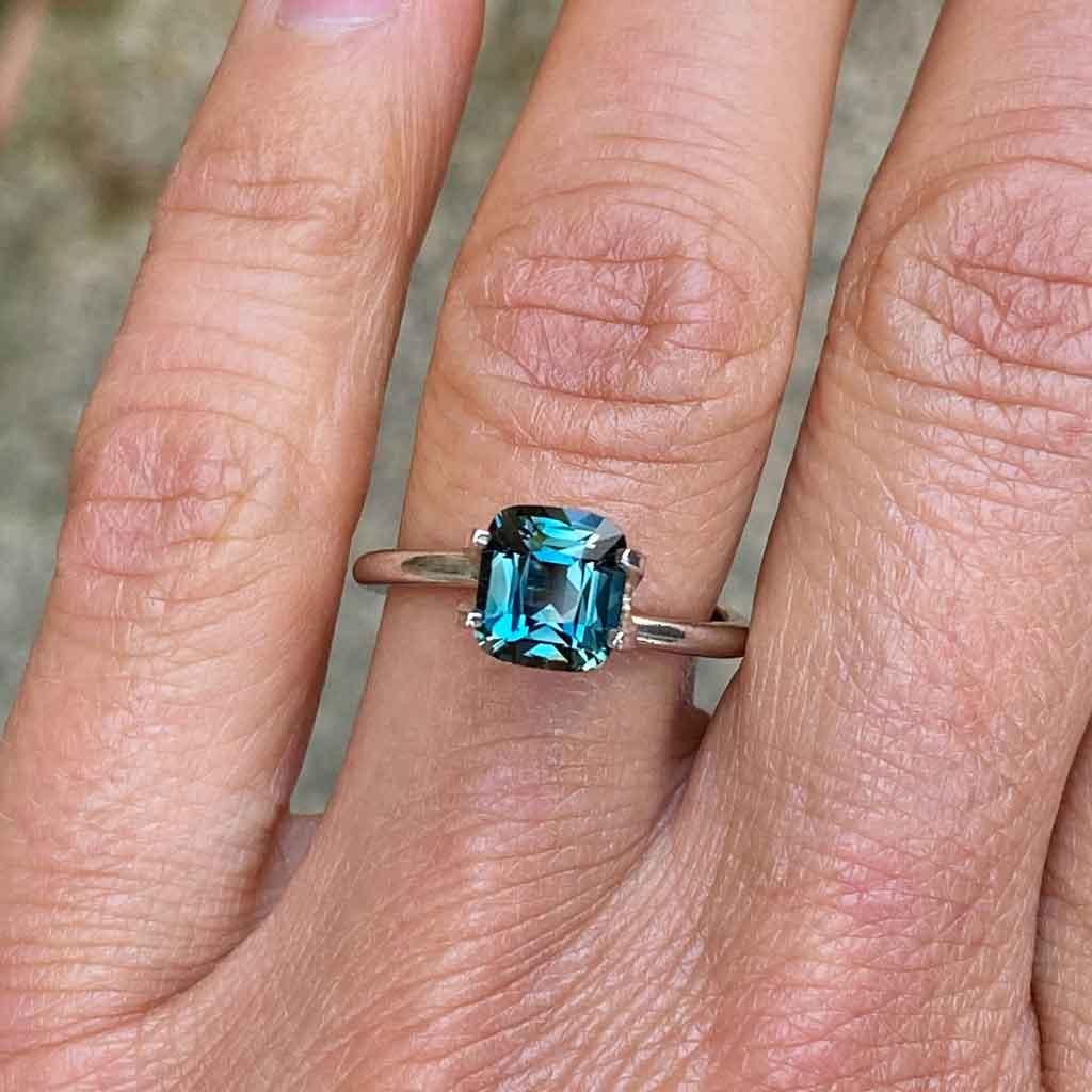 1.7ct cushion cut Madagascan teal sapphire - Lizunova Fine Jewels