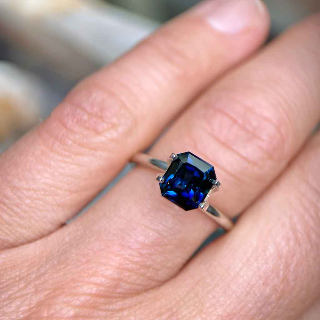 Emerald radiant cut Australian teal sapphire bespoke engagement ring Sydney jeweller Lizunova Fine Jewels Australia