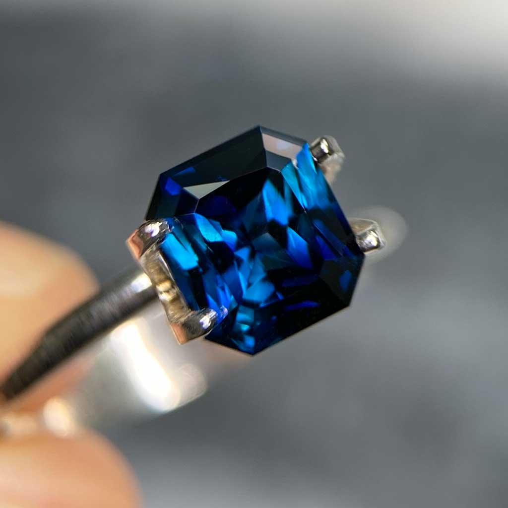 Emerald radiant cut Australian teal sapphire bespoke engagement ring Sydney jeweller Lizunova Fine Jewels Australia