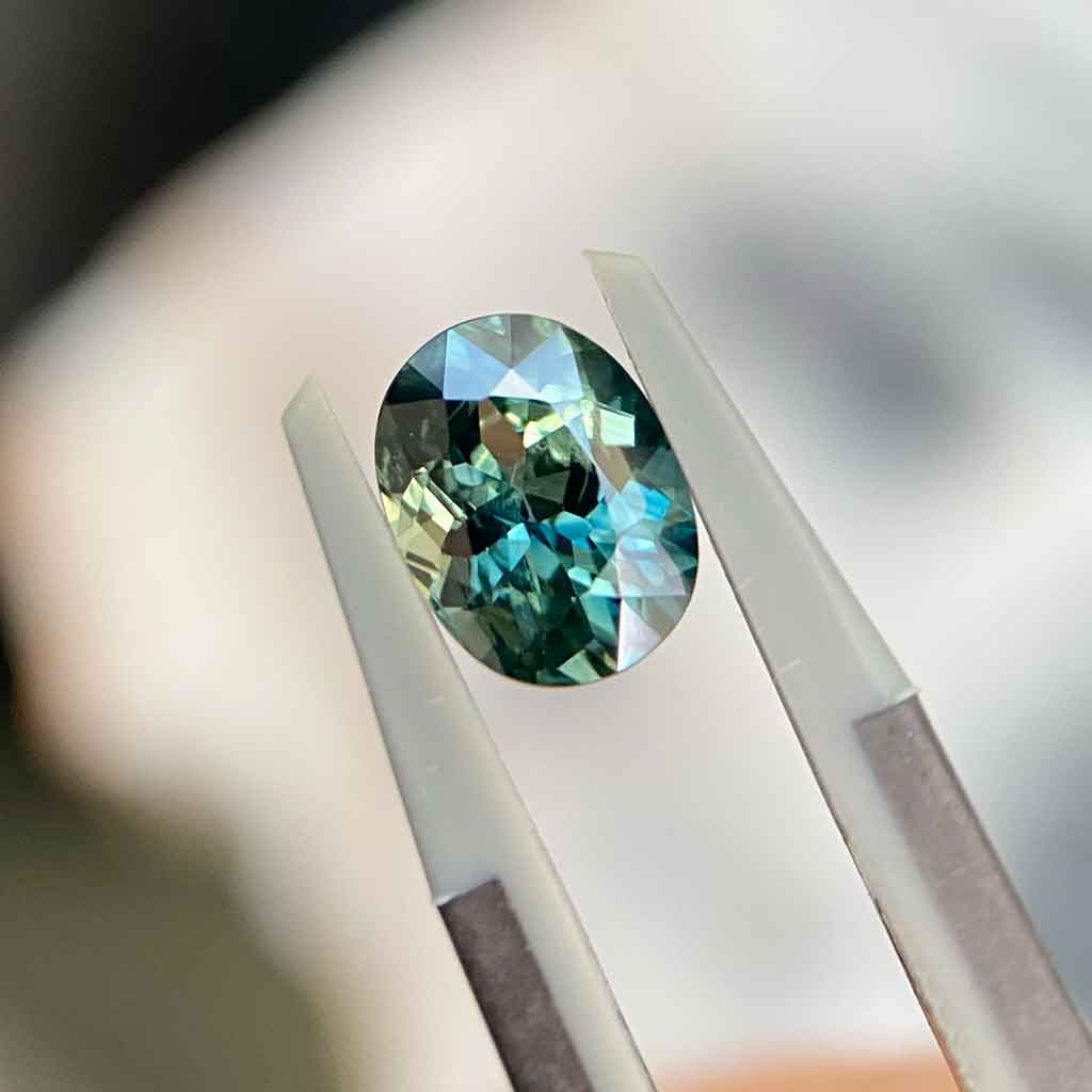 Australian seafoam teal sapphire available to set in a bespoke sapphire ring by Australian jeweller Lizunova, Sydney