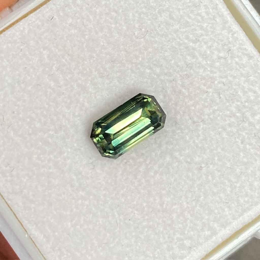 Australian-emerald-cut-teal-sapphire-bespoke-engagement-ring-Sydney-jeweller-Lizunova-Fine-Jewels jeweller Lizunova Fine Jewels