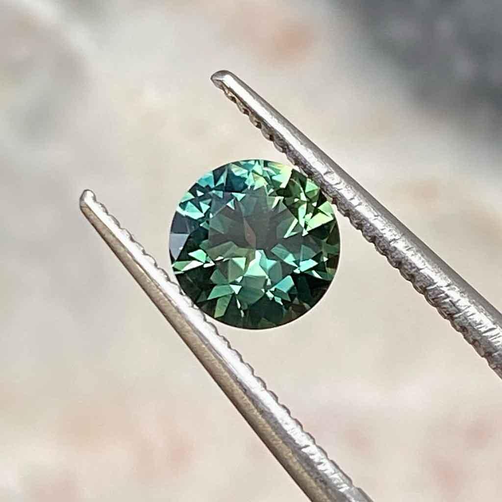 0.96ct round Australian light green sapphire - Lizunova Fine Jewels