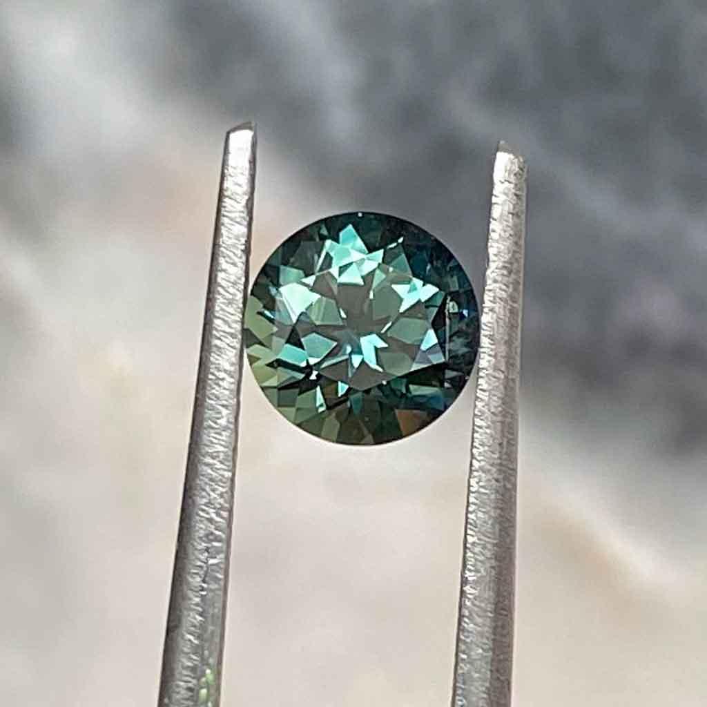 1.06ct round Australian teal sapphire - Lizunova Fine Jewels