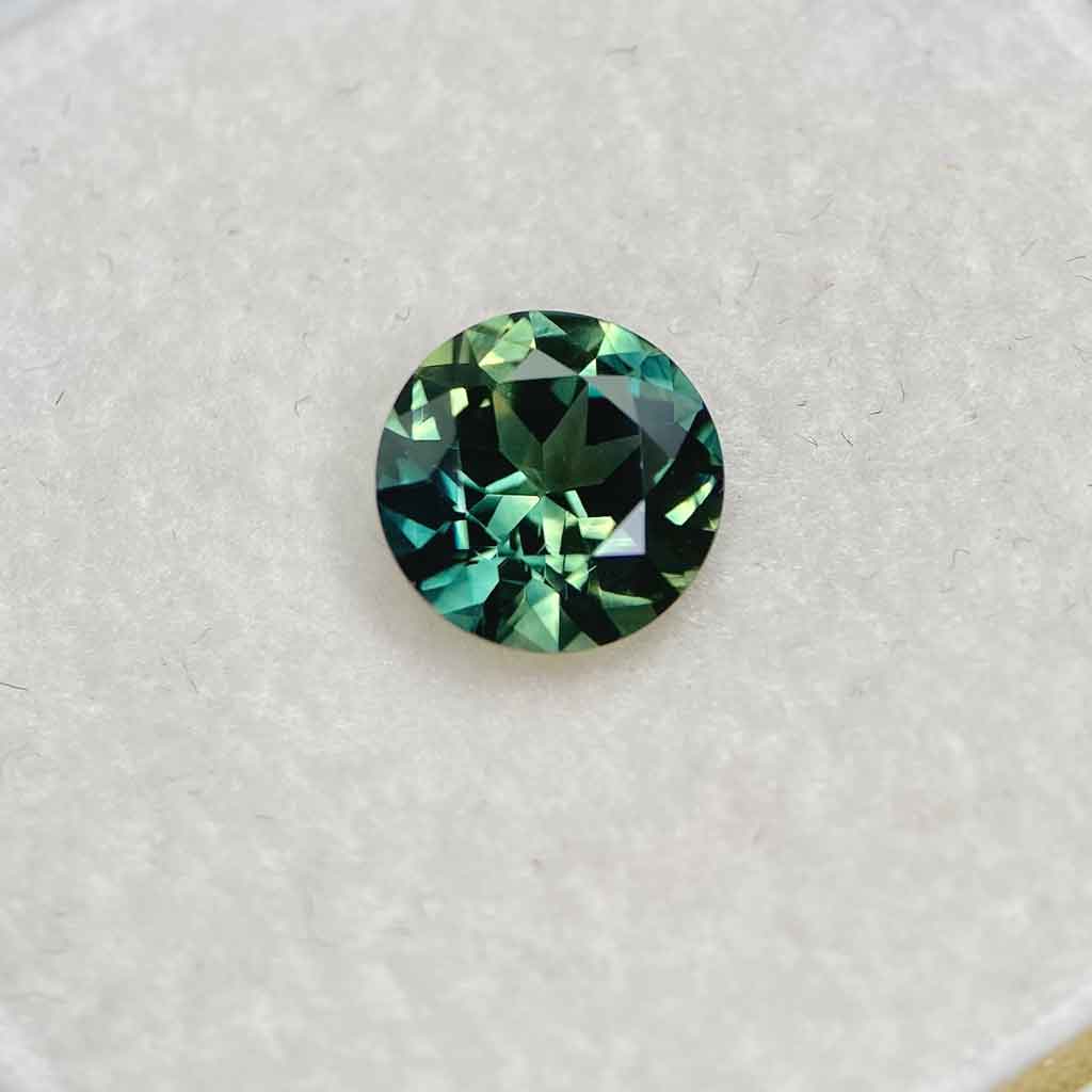 2.08ct round Australian teal parti sapphire, Sydney jeweller Lizunova Fine Jewels