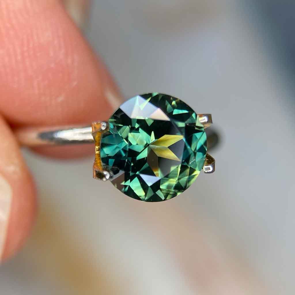 2.08ct round Australian teal parti sapphire, Sydney jeweller Lizunova Fine Jewels
