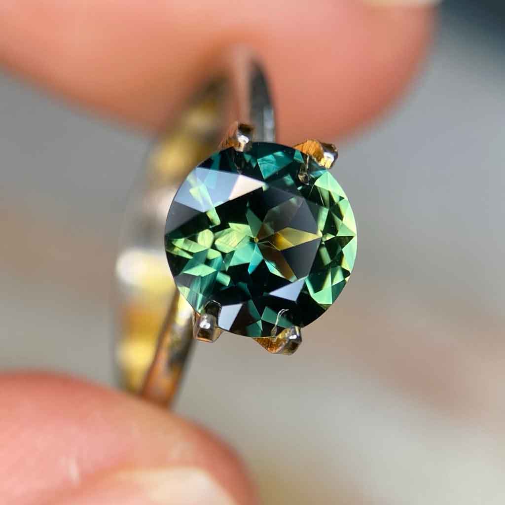 2.08ct round Australian teal parti sapphire, Sydney jeweller Lizunova Fine Jewels