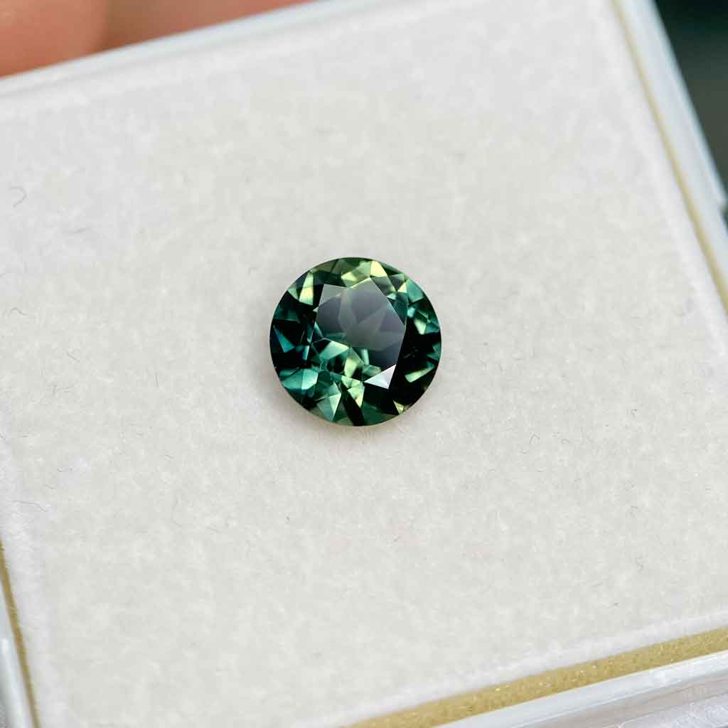 2.08ct round Australian teal parti sapphire, Sydney jeweller Lizunova Fine Jewels