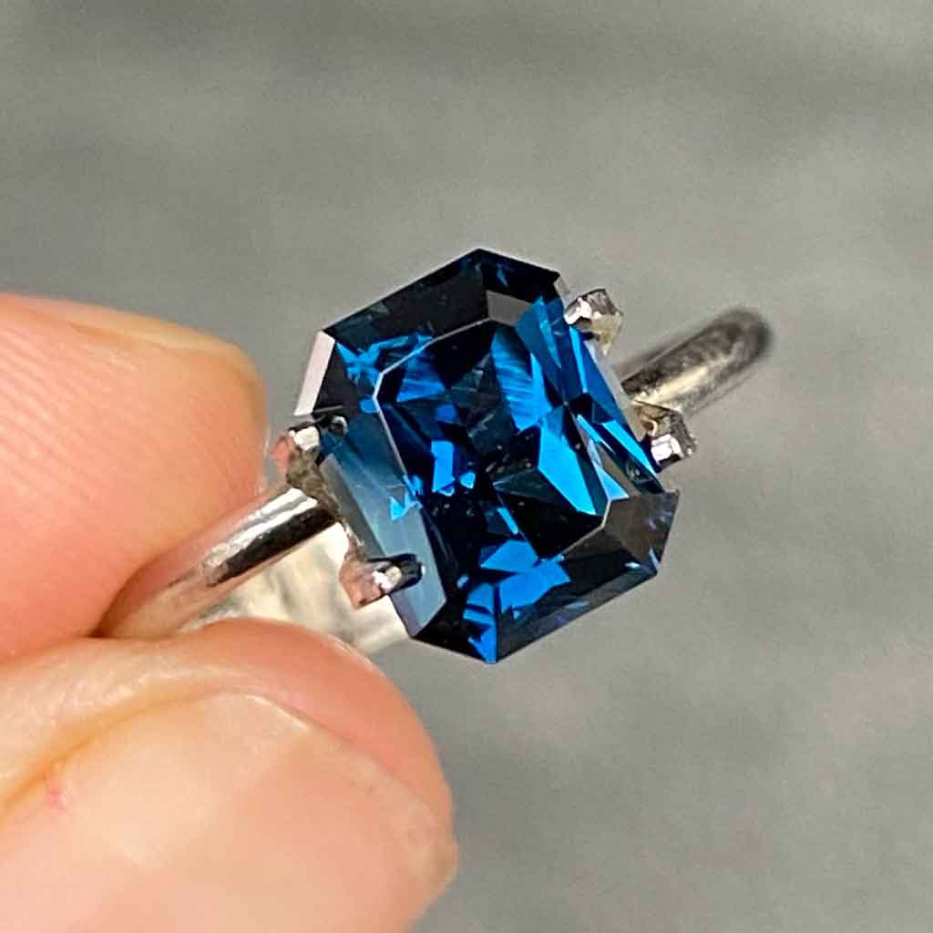 Australian-emerald-radiant-cut-teal-sapphire-bespoke-engagement-ring-Sydney-jeweller-Lizunova-Fine-Jewels jeweller Lizunova Fine Jewels