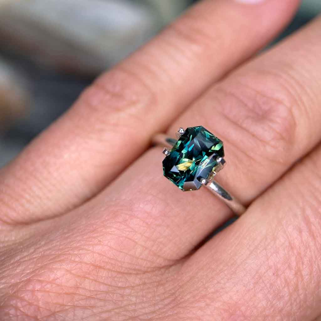 2.51ct emerald radiant cut Australian teal parti sapphire available to set in a bespoke sapphire engagement ring by Sydney jeweller Lizunova NSW Australia