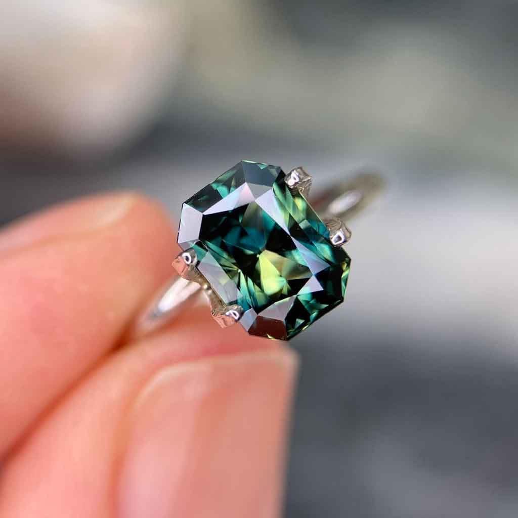 2.51ct emerald radiant cut Australian teal parti sapphire available to set in a bespoke sapphire engagement ring by Sydney jeweller Lizunova NSW Australia