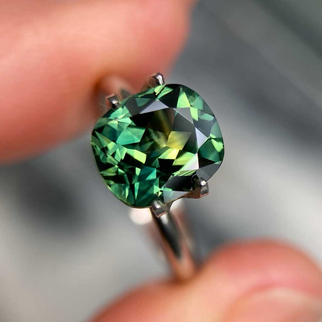 2.71ct cushion cut Australian parti sapphire available for a bespoke engagement ring by Lizunova Fine Jewels