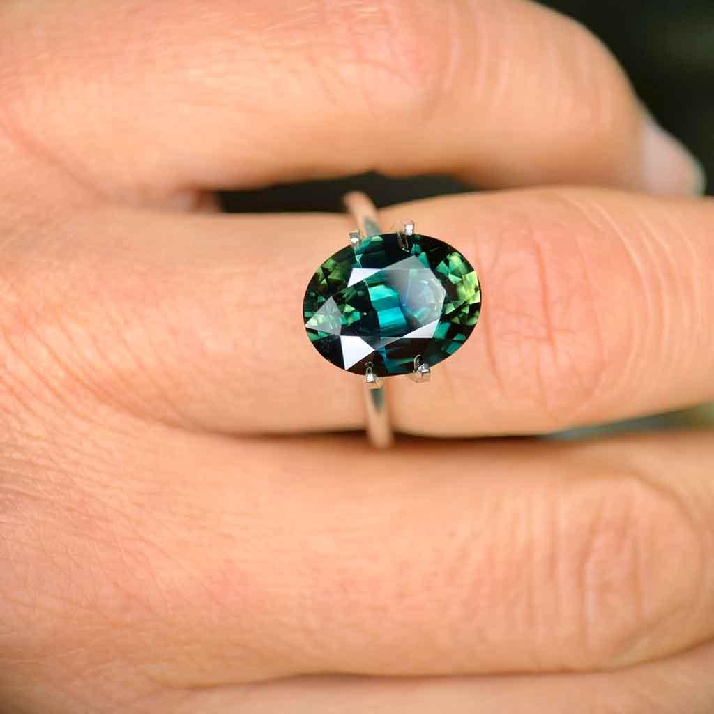 4.69ct oval Australian teal parti sapphire - Lizunova Fine Jewels