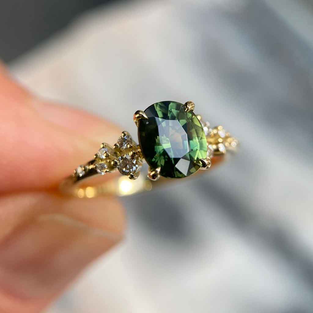 Asymmetric sapphire and diamond engagement ring by Sydney jeweller Lizunova