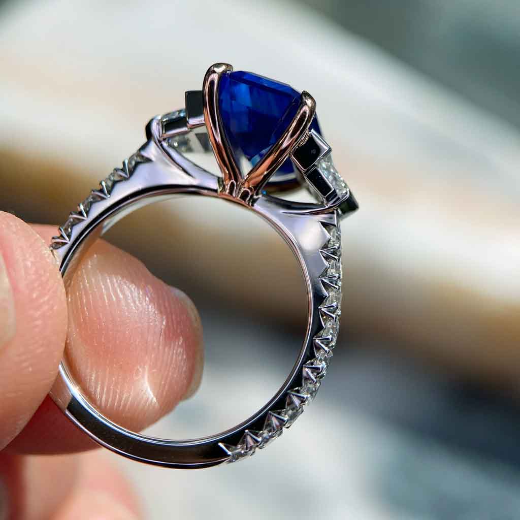 Annick | Emerald cut blue sapphire diamond engagement ring
