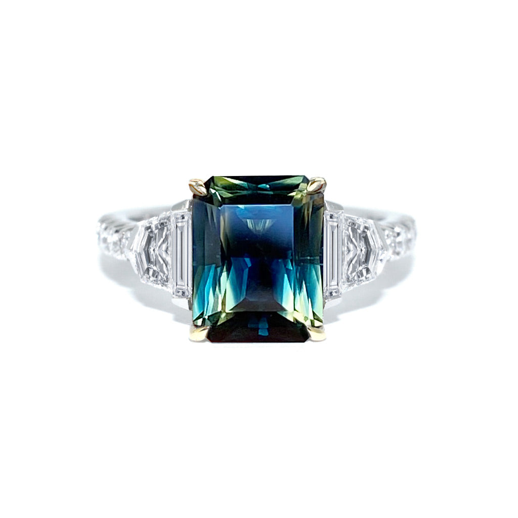 Australian parti teal emerald cut sapphire bespoke engagement ring Sydney jeweller Lizunova Fine Jewels Sydney Australia