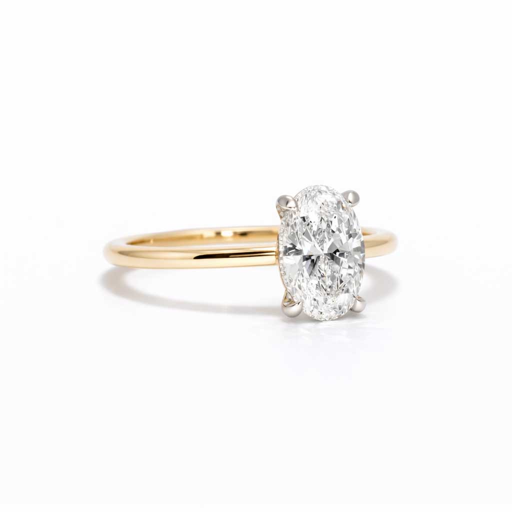 Billie | Oval diamond engagement ring with a hidden halo