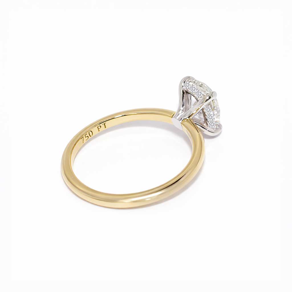 Billie | Oval diamond engagement ring with a hidden halo