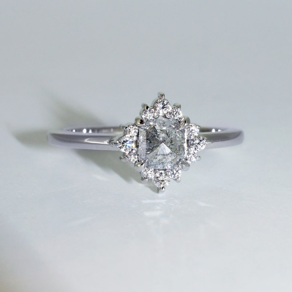 A salt and pepper diamond engagement ring with a diamond halo, by Sydney jeweller Lizunova Fine Jewels, Australia
