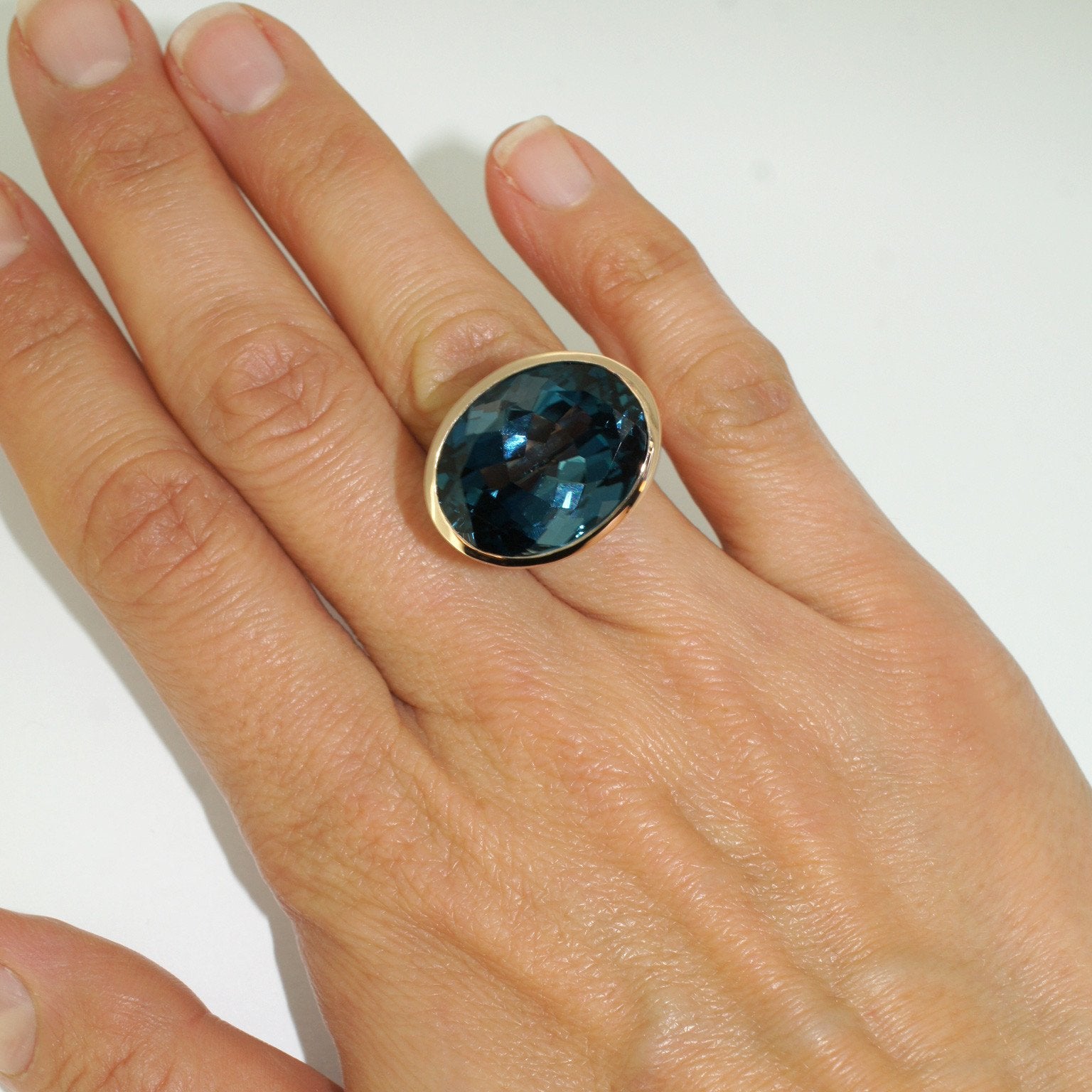 Illuminaire-London-Blue-topz-rose-gold-cocktail-ring-Lizunova-Fine-Jewels-Sydney-jeweller-NSW-Australia