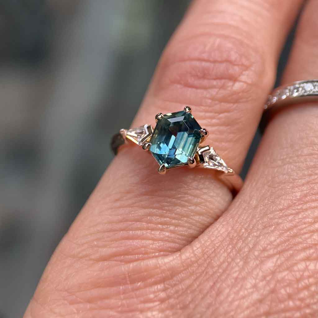 Maddie - Hexagon teal sapphire & kite diamond trilogy engagement ring - Lizunova