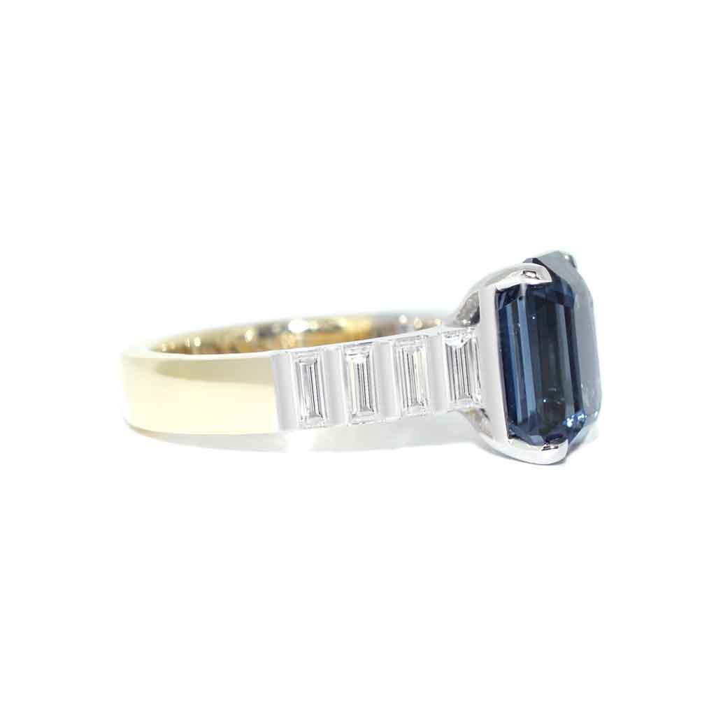Bespoke emerald cut grey spinel and baguette diamond engagement ring handcrafted in platinum & 18k gold by Sydney jeweller Lizunova, Australia