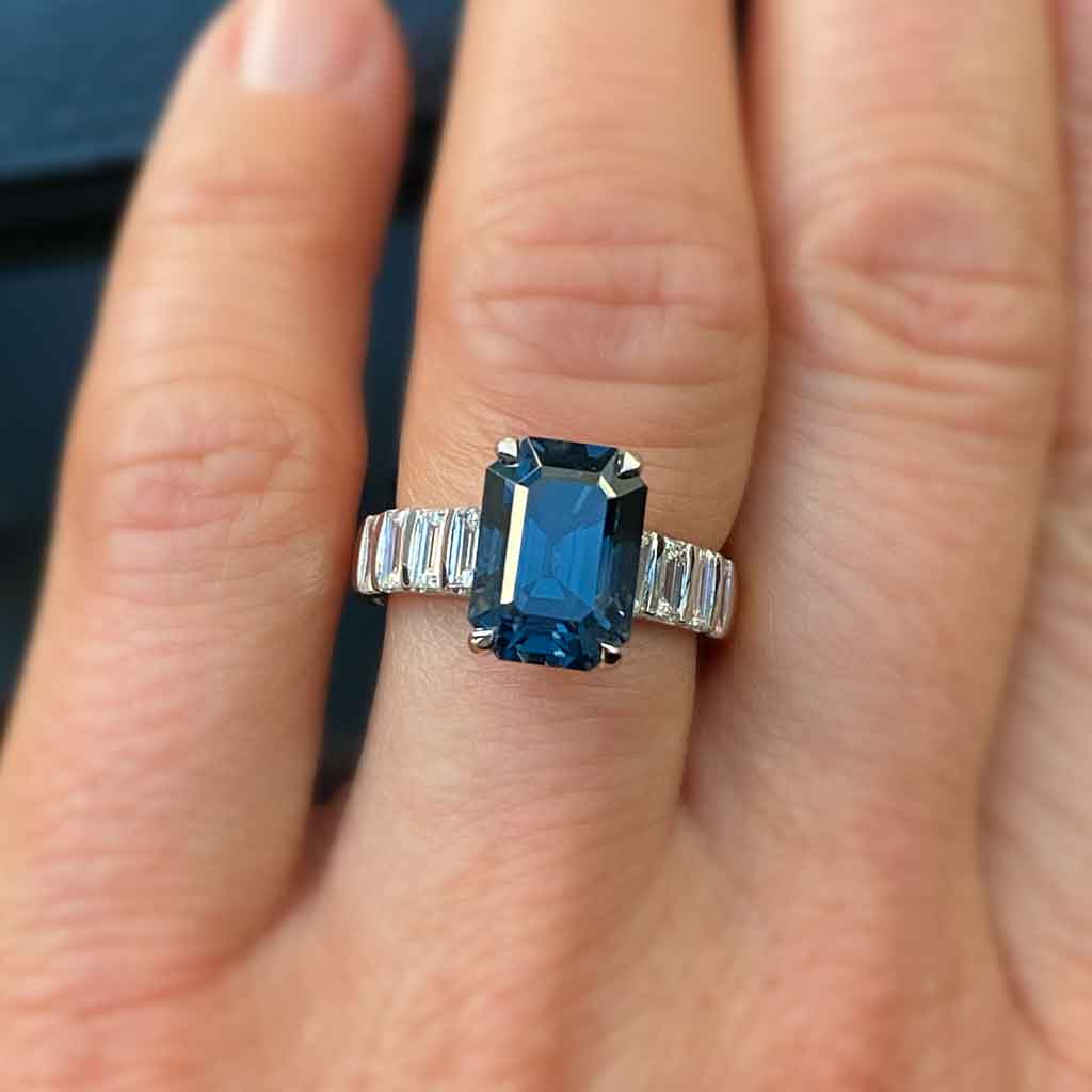 Bespoke emerald cut grey spinel and baguette diamond engagement ring handcrafted in platinum & 18k gold by Sydney jeweller Lizunova, Australia