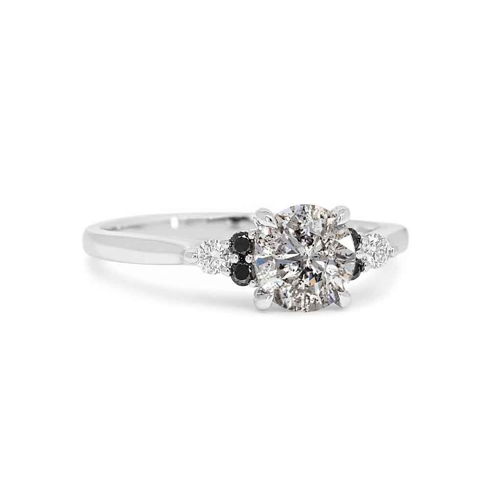 Salt and pepper diamond cluster engagement ring with black diamonds and white diamond accents, crafted in white gold by Sydney jeweller Lizunova