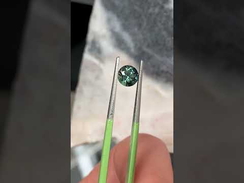 1ct round Australian teal sapphire, Sydney jeweller Lizunova Fine Jewels