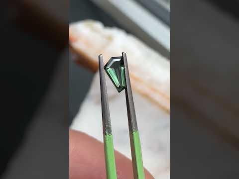 0.73ct freeform Australian teal sapphire, Sydney jeweller Lizunova Fine Jewels