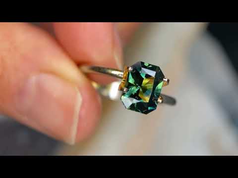 A natural emerald radiant cut Australian teal sapphire, available to be set into a bespoke sapphire ring, by Sydney jeweller Lizunova, Australia