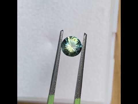 0.68ct round Australian parti sapphire, available for a bespoke sapphire engagement ring, by Sydney jeweller Lizunova Fine Jewels, Australia