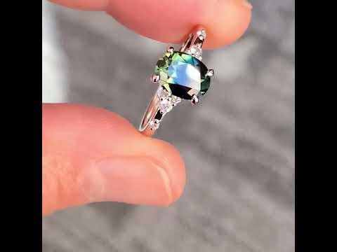 Aria engagement ring with an Australian teal parti sapphire and diamonds, by Sydney jeweller Lizunova Fine Jewels