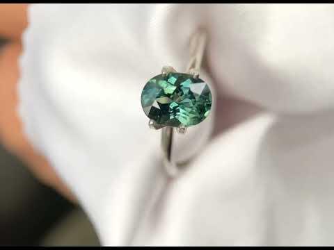 Australian seafoam teal sapphire available to set in a bespoke sapphire ring by Australian jeweller Lizunova, Sydney
