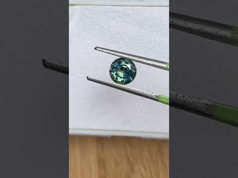 1.22ct round Australian teal parti sapphire, Sydney jeweller Lizunova Fine Jewels, Australia