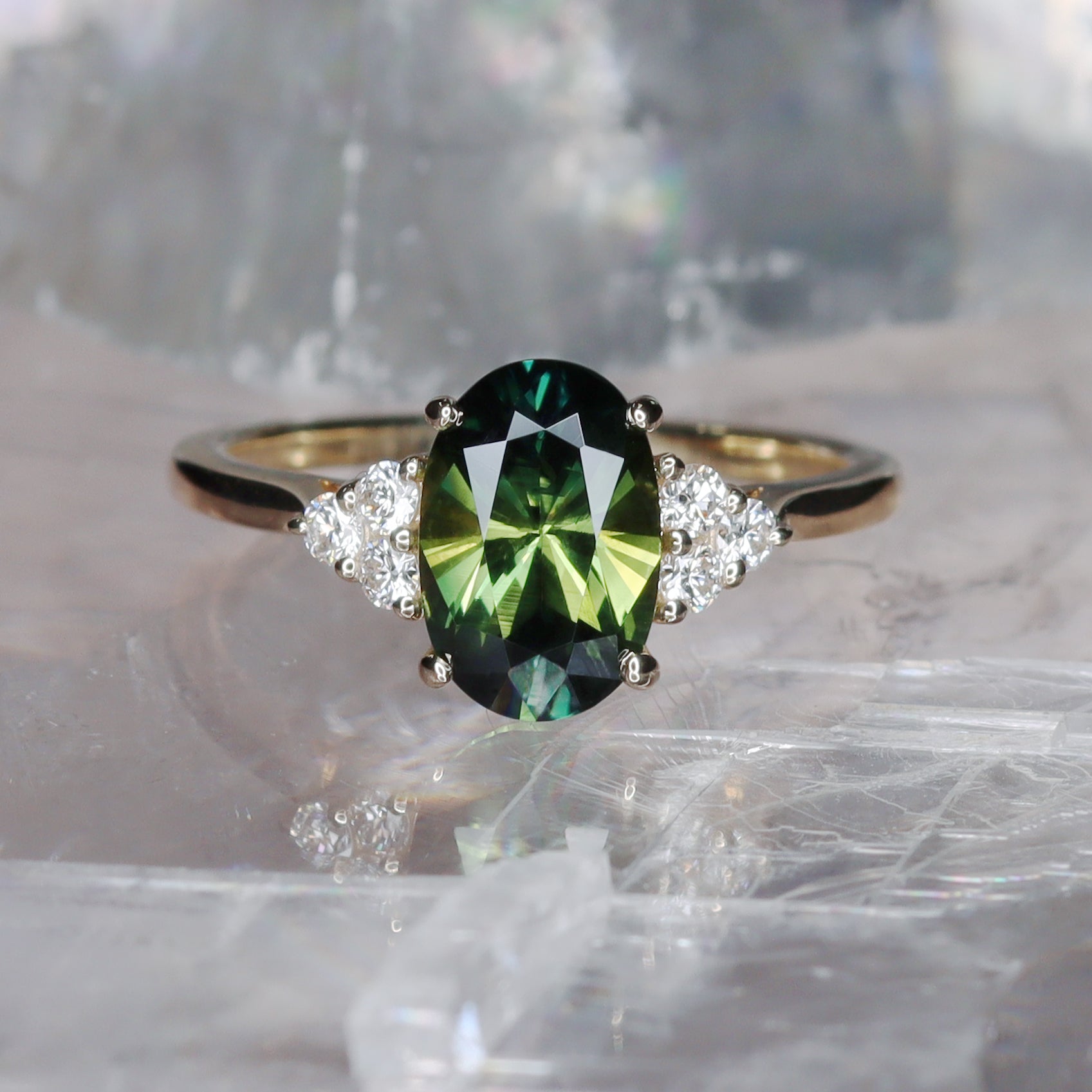 Australian teal parti sapphire and diamond engagement ring by Sydney jeweller Lizunova, Australia