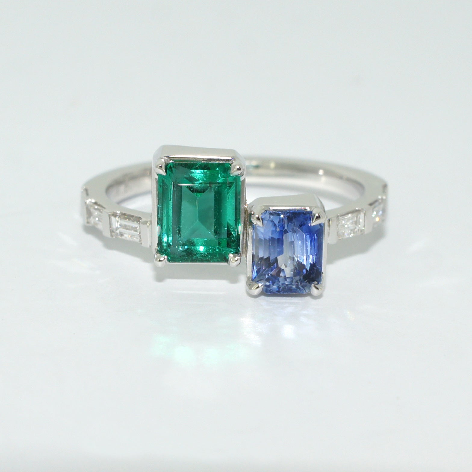 Lizunova bespoke emerald and sapphire toi et moi ring with diamonds by Sydney jeweller Lizunova