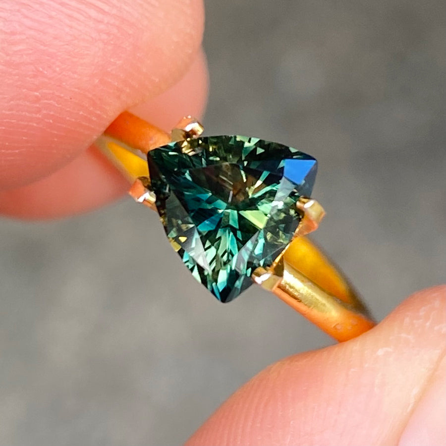 Australian-trilliant-parti-teal-sapphire-bespoke-engagement-ring-Sydney-jeweller-Lizunova-Fine-Jewels