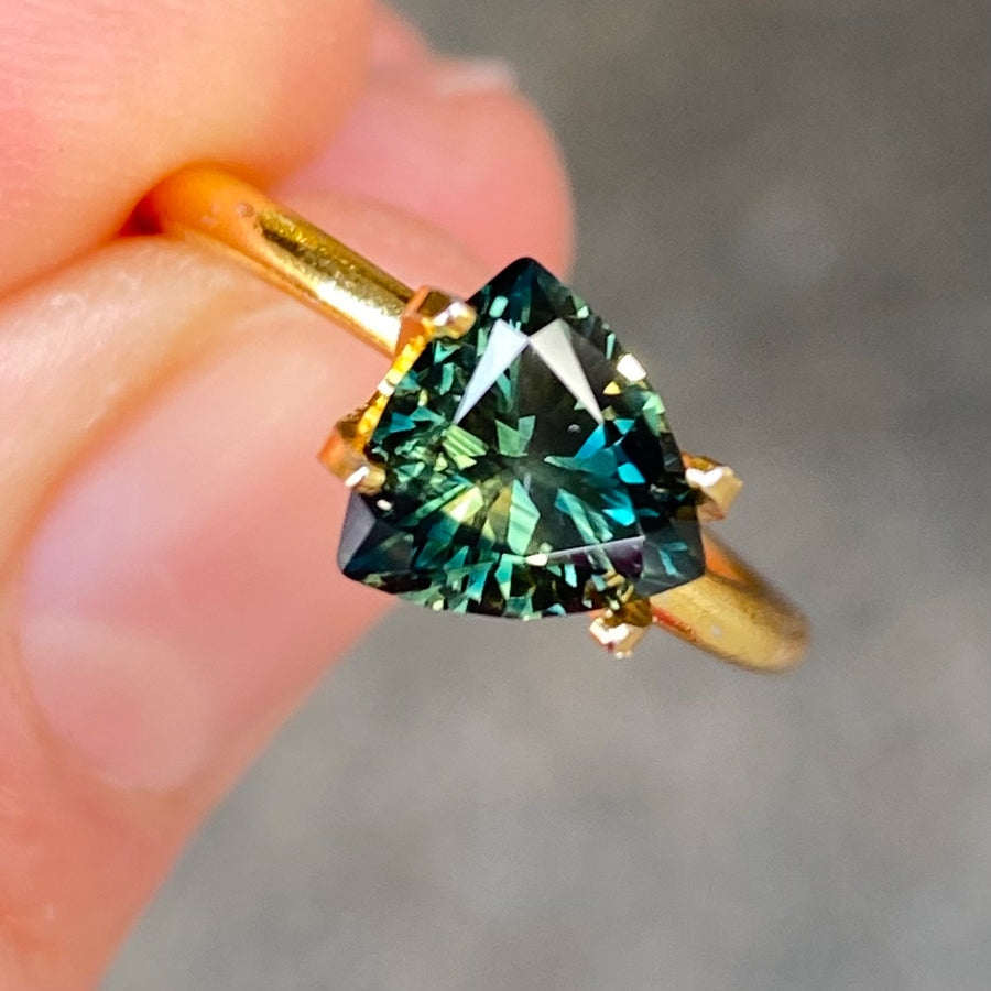 Australian-trilliant-parti-teal-sapphire-bespoke-engagement-ring-Sydney-jeweller-Lizunova-Fine-Jewels